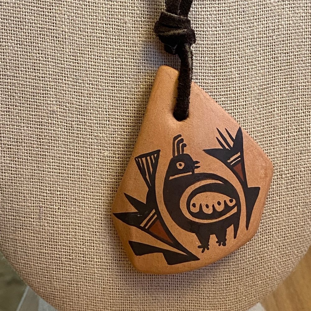 Unique Acoma pottery necklace on a 24 inch leather cord signed Iule